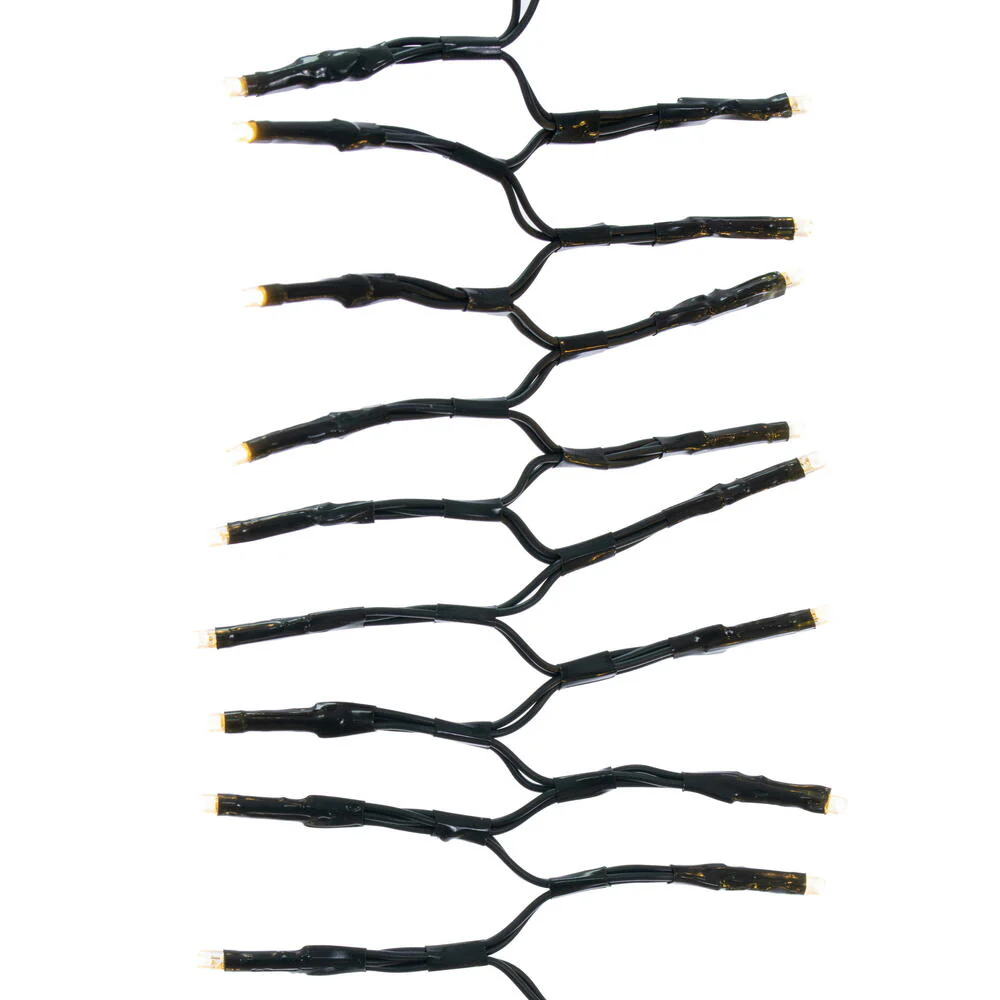 Vickerman 960Lt LED Warm White Flowing Cluster Icicle Set, 10' Long, Memory Remote Controlled with 8 Hour On/Off Timer.  Has 12-31